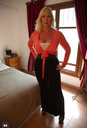 Leggy European solo girl toys asshole while masturbating shaved pussy